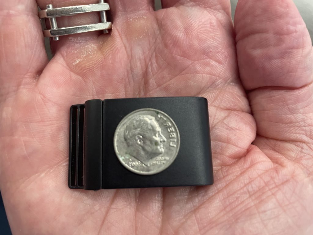 Whoop device size compared to a dime