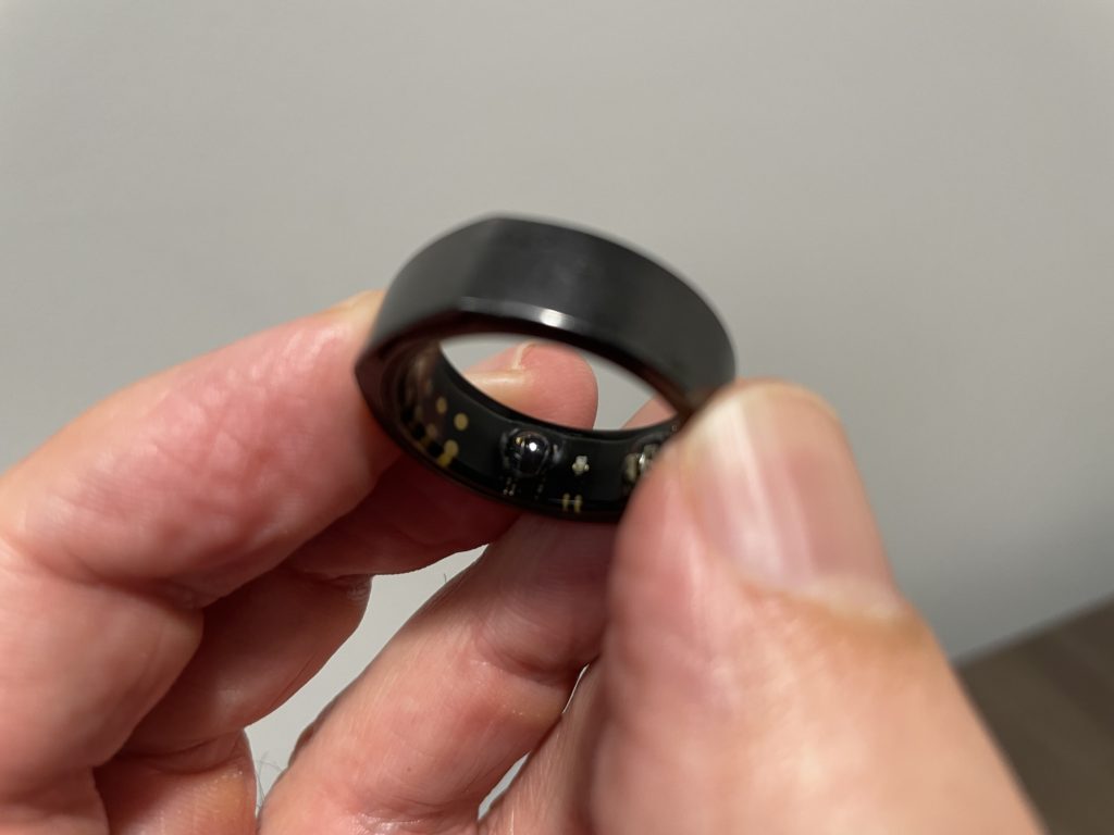 Oura ring photo in hand